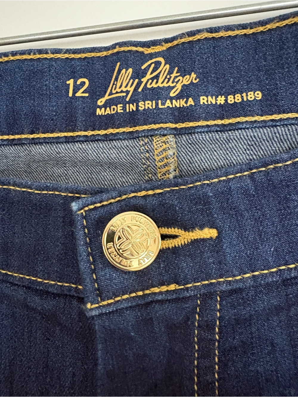 Lilly Pulitzer Navy Blue High-Rise Jeans with Gold Button Size 12 - uncut length